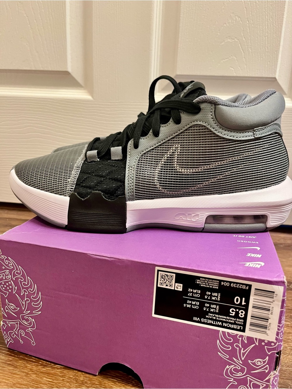 Nike Lebron Witness VIII Gray and Black Basketball Shoe with Visible Swoosh